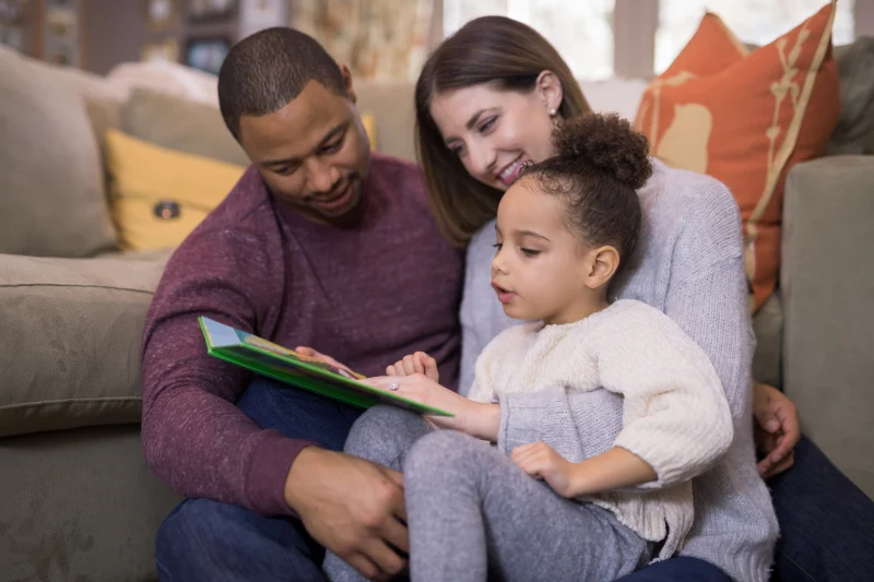 Parents reading with child